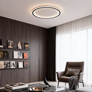 Modern living room with a recessed led circle ceiling lamp creating soft ambient lighting.