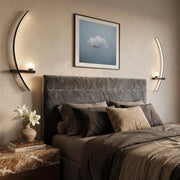 LED curved wall light installed on both sides of a bed, featuring slim arc-shaped lighting with warm ambient glow.