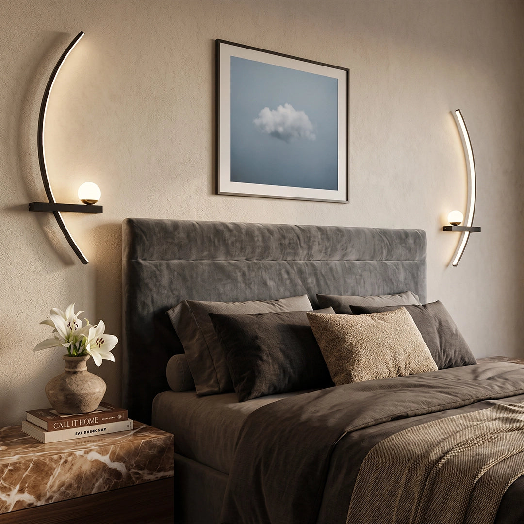 LED curved wall light installed on both sides of a bed, featuring slim arc-shaped lighting with warm ambient glow.
