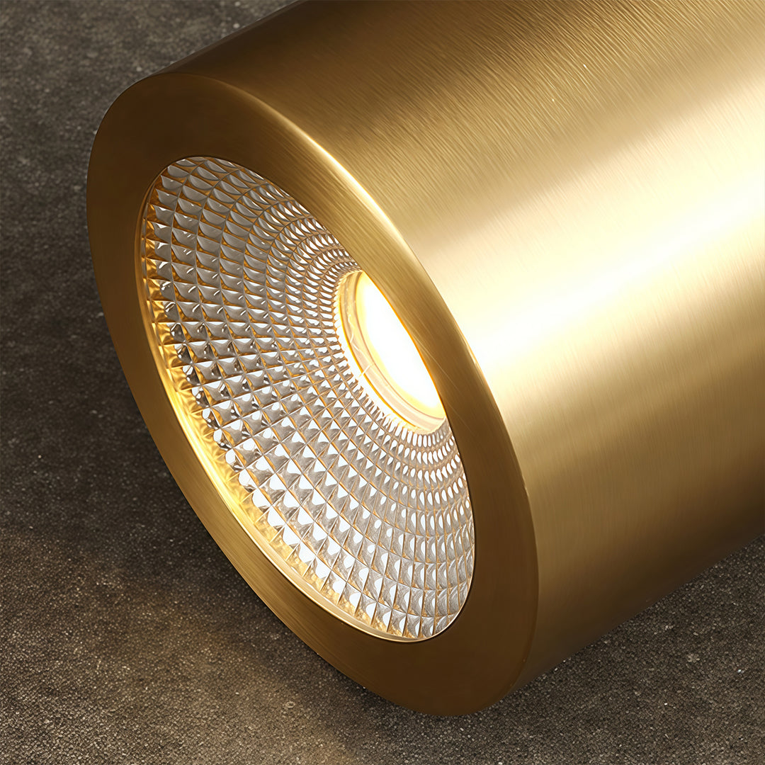 Close-up of LED downlight reflector with anti-glare textured surface.