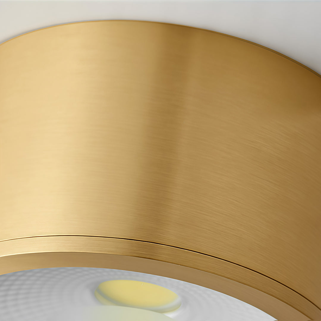 Brushed metal housing detail of a cylindrical LED downlight.