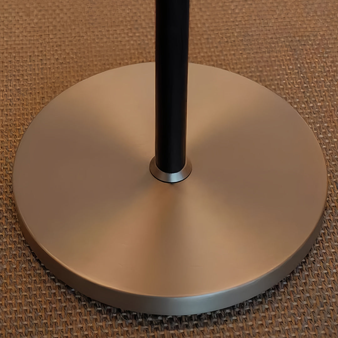 Close-up view of LED floor lamp base showing premium brass construction details