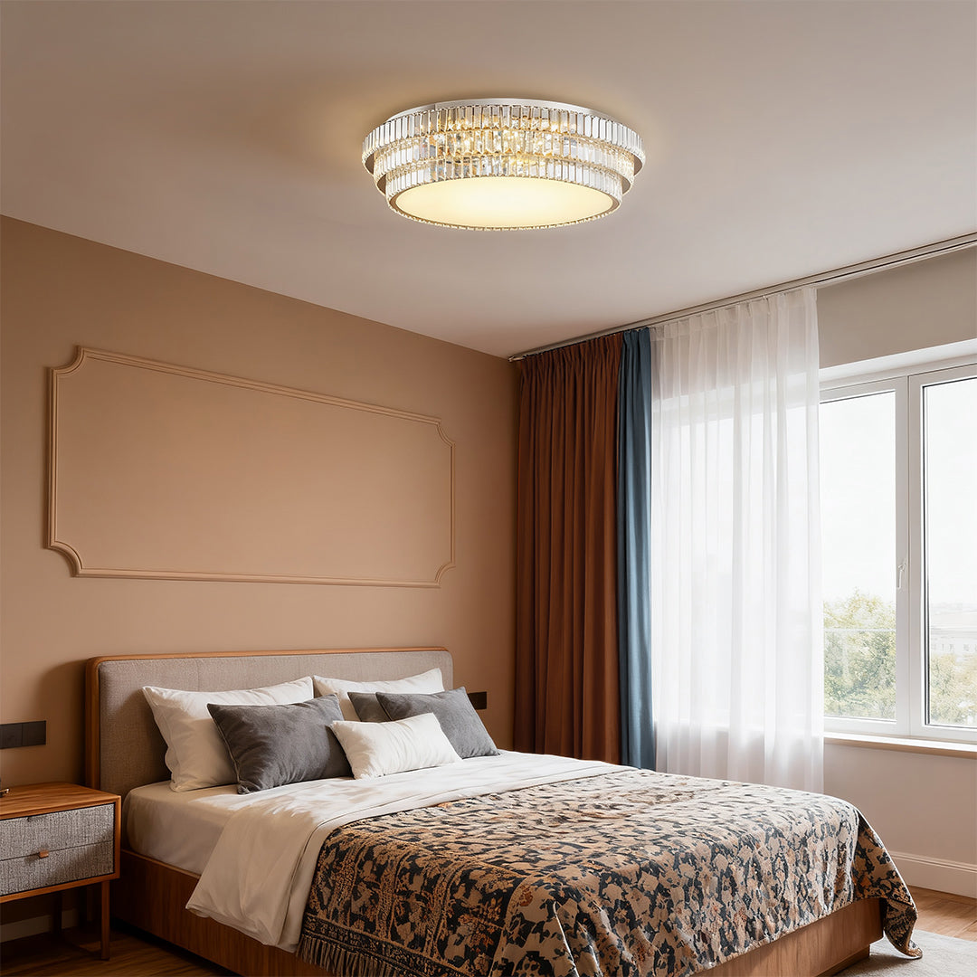 Round LED flush mount lighting illuminating a modern bedroom.