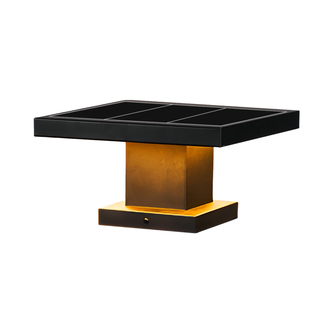 Angled view of a square led gate pillar light featuring a matte black top and brushed gold body.