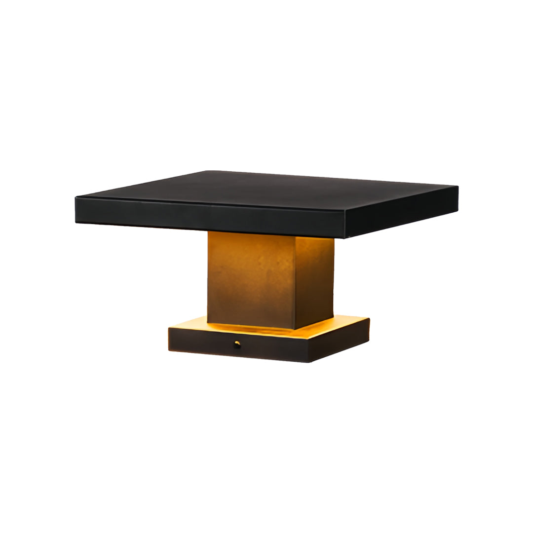 Front product view of a compact square led gate pillar light featuring a black flat top and gold pillar body.