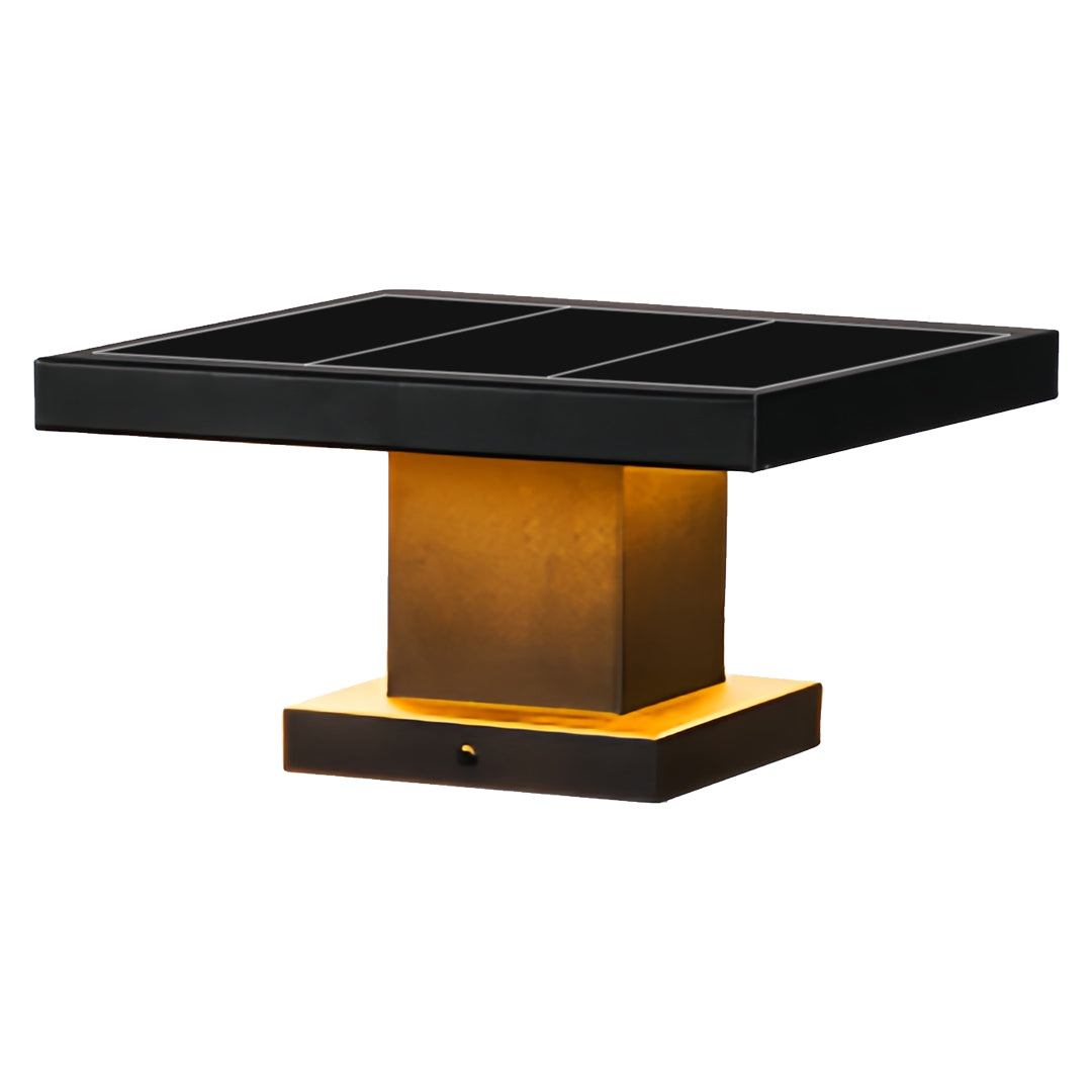 Night outdoor installation of a led gate pillar light illuminating a stone pillar with warm ambient glow.