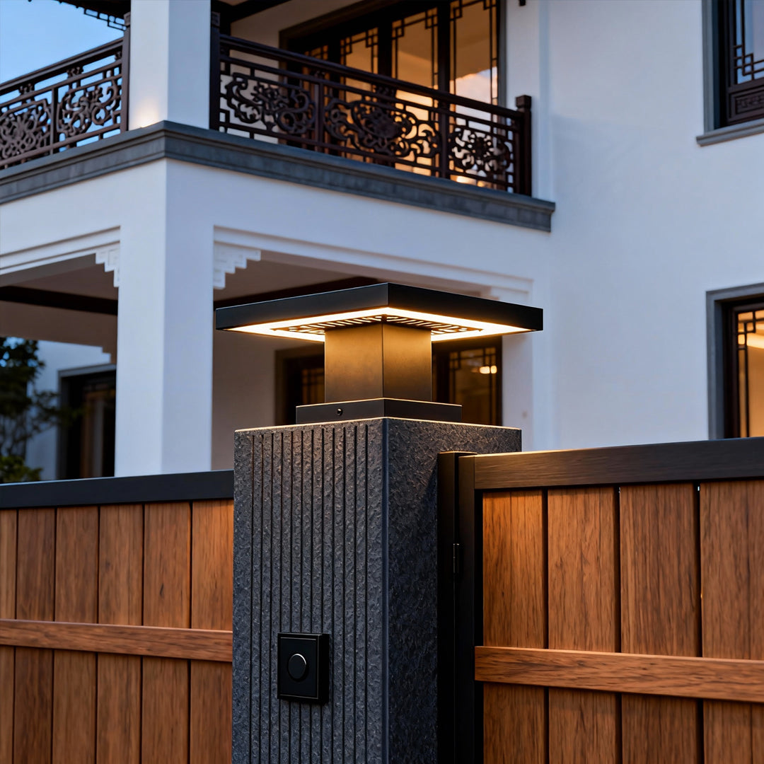 Outdoor scene showcasing a led gate pillar light on a stone wall, providing warm architectural illumination.