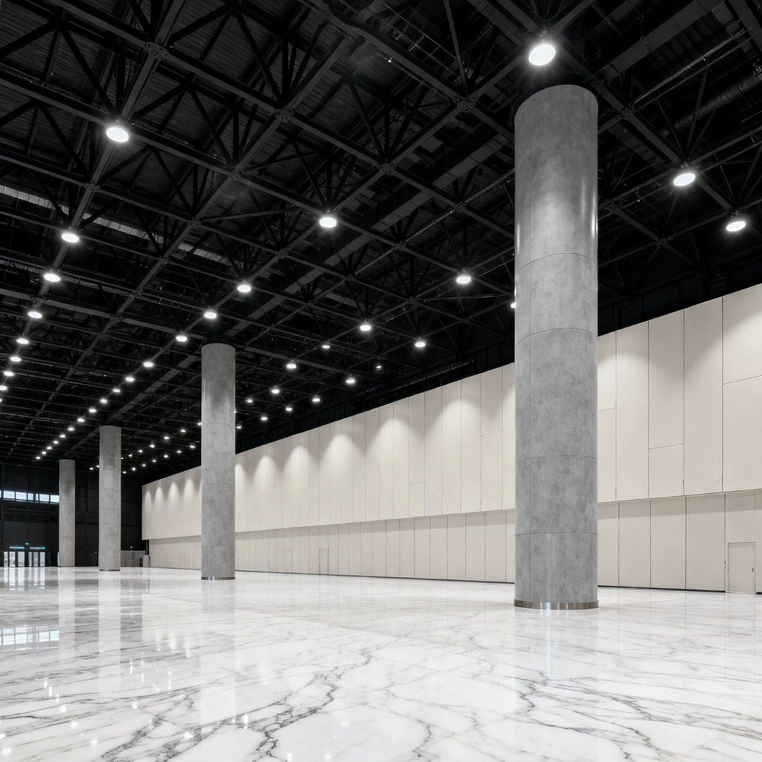 LED lamp for warehouse casting uniform light in a modern warehouse with concrete floors.