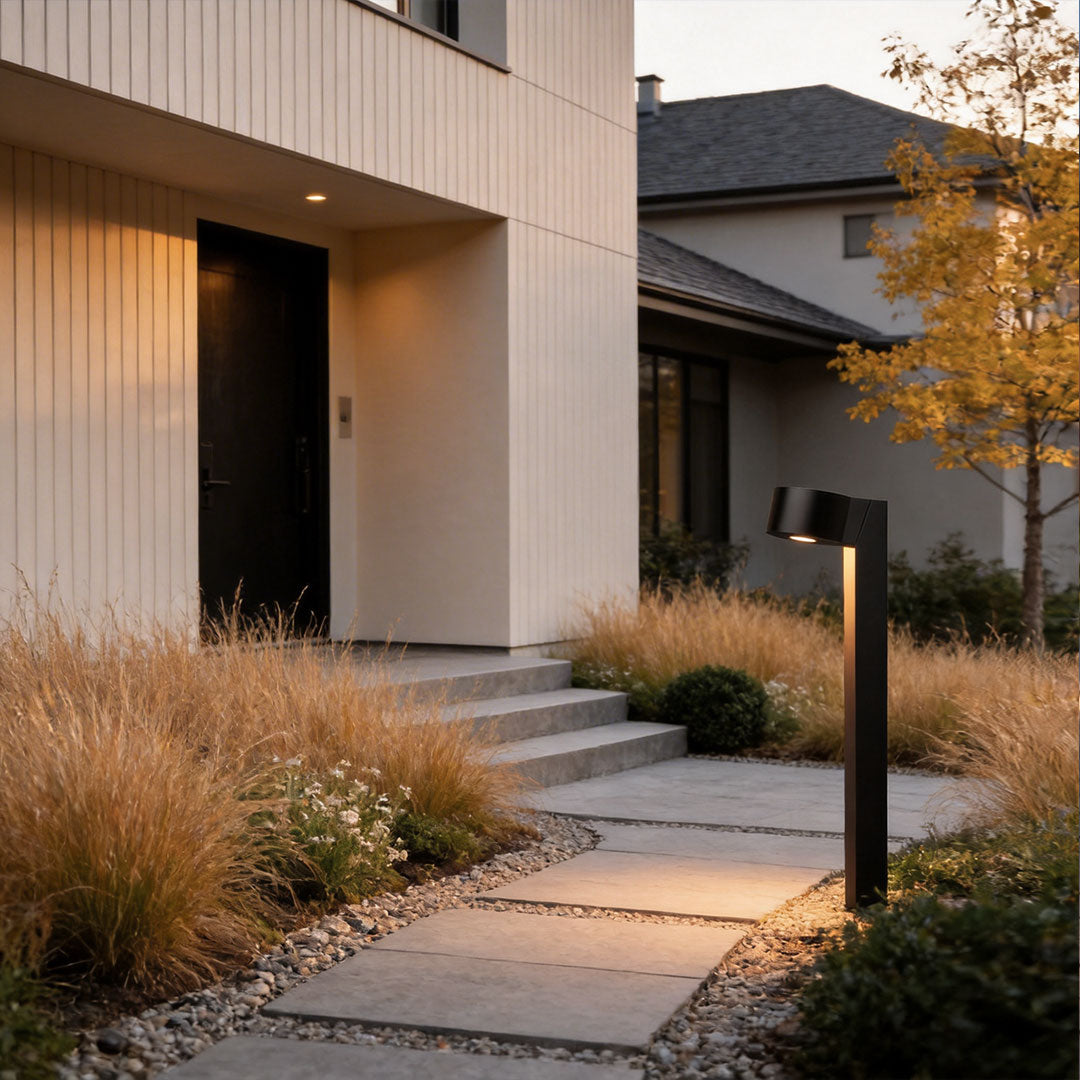 LED landscape path lighting highlighting a front entry path with warm downward illumination.