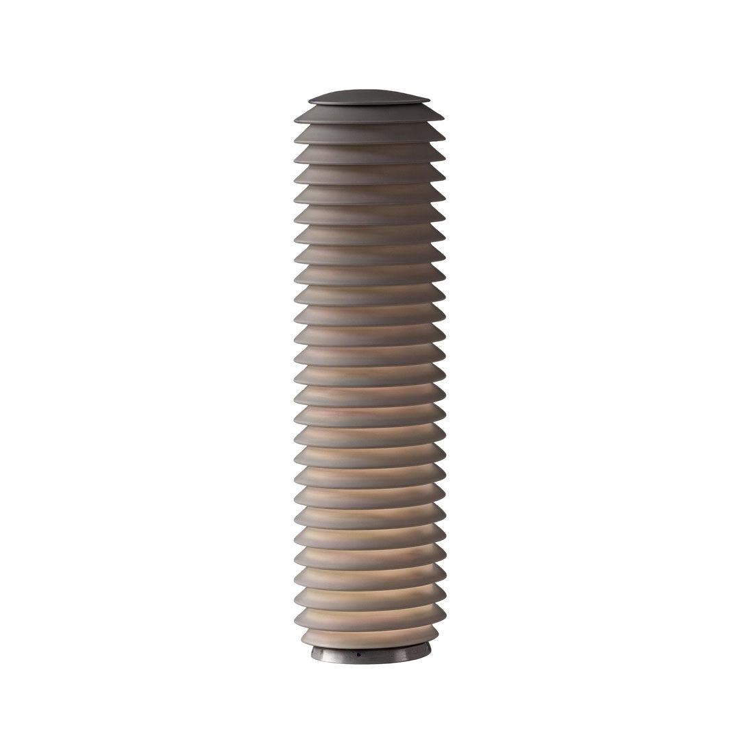 LED light bollard with a black finish, enhancing a modern exterior.