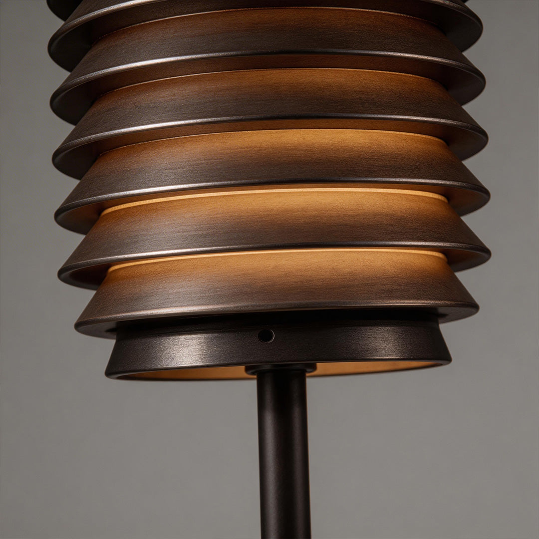 Close-up of LED light bollard showcasing its layered and durable design.