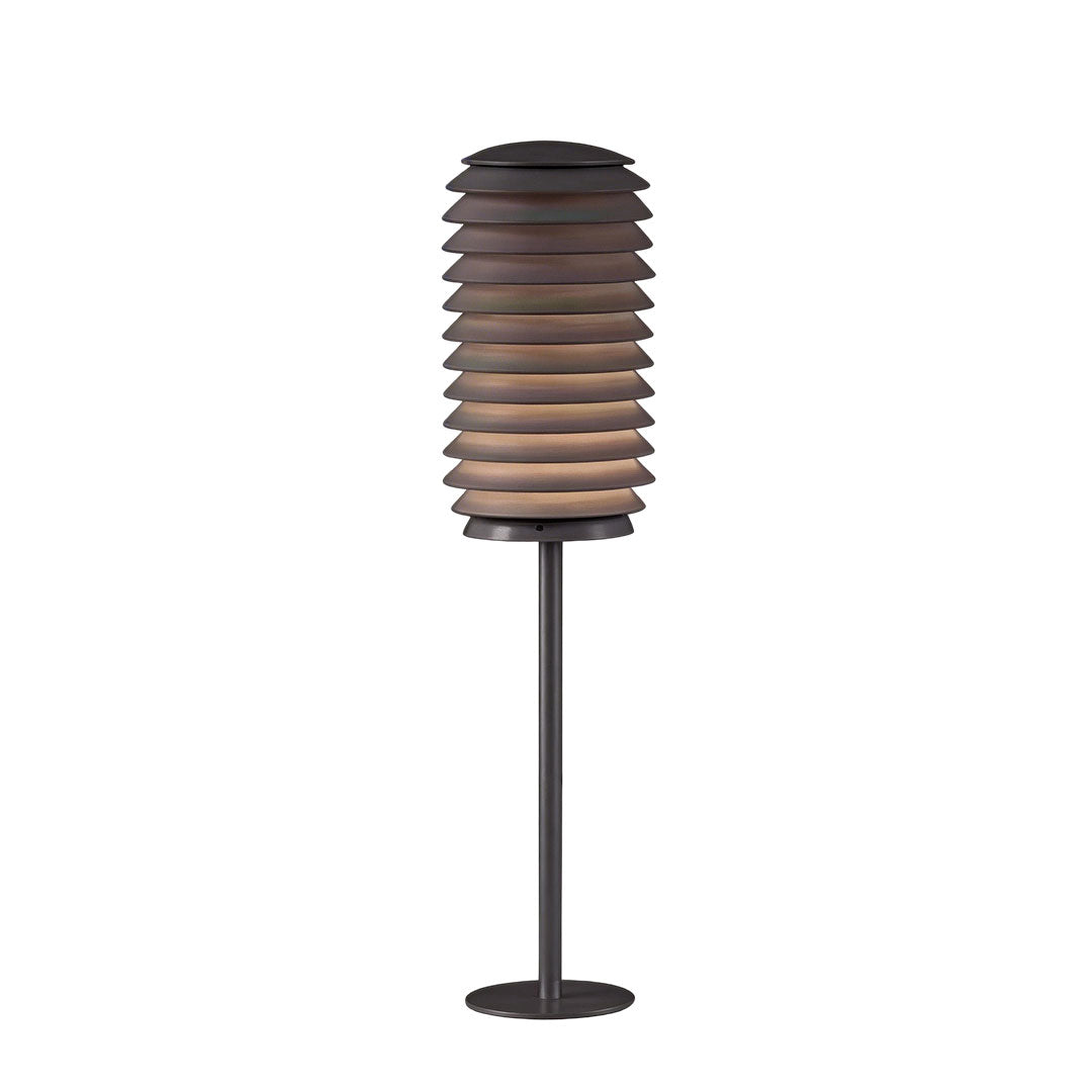 LED light bollard with a sleek design, placed on a concrete surface.