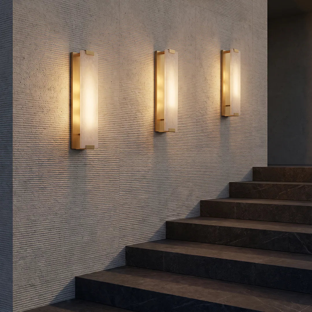 LED light wall lamp fixtures creating warm vertical illumination along an outdoor staircase.