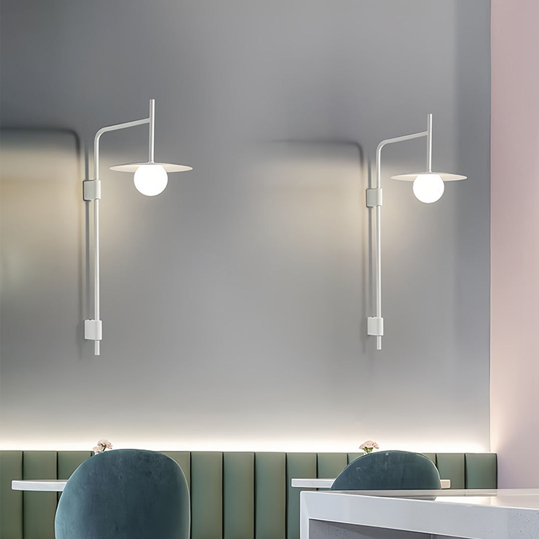 LED light wall lamp beside modern staircase with dark accent wall creating dramatic architectural lighting