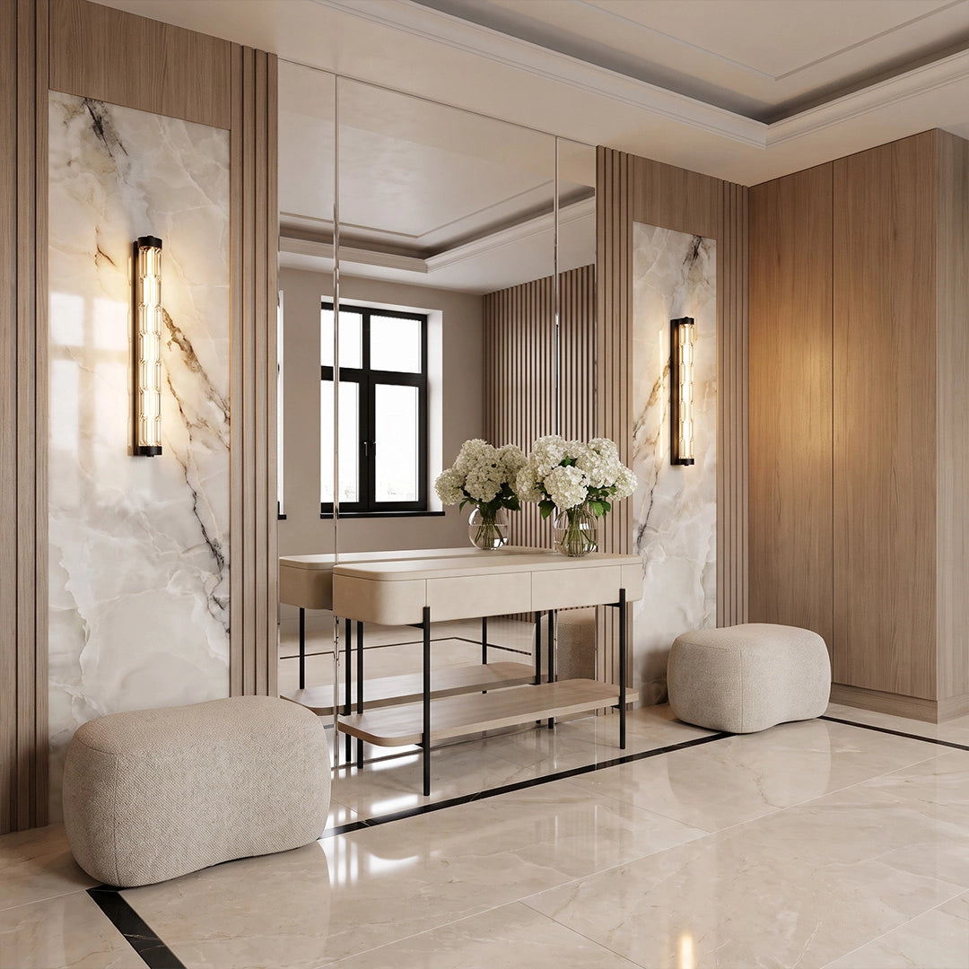 LED linear wall lights installed beside mirrors in a luxurious marble bathroom vanity area.