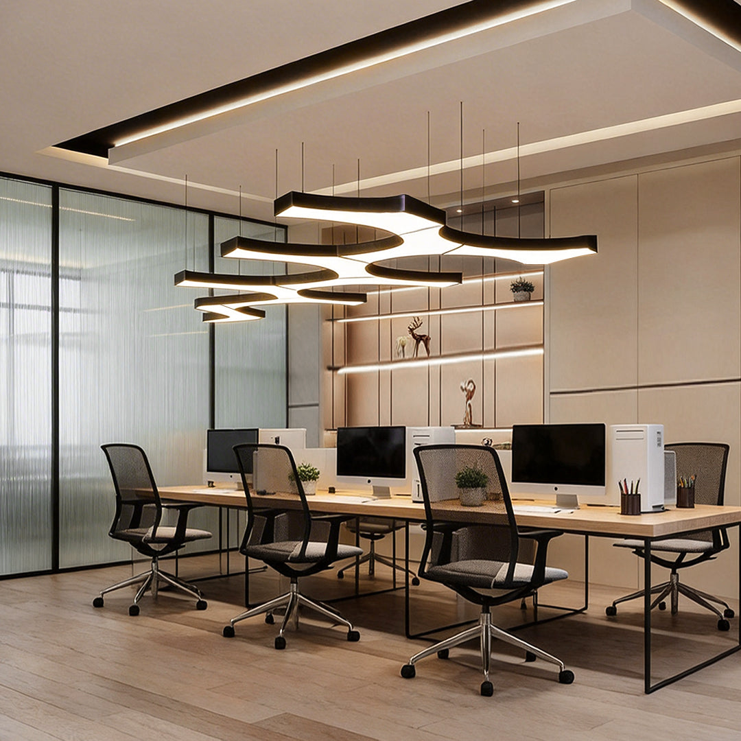 Stylish LED modern chandelier with elongated light fixtures in a bright, open-plan office environment.