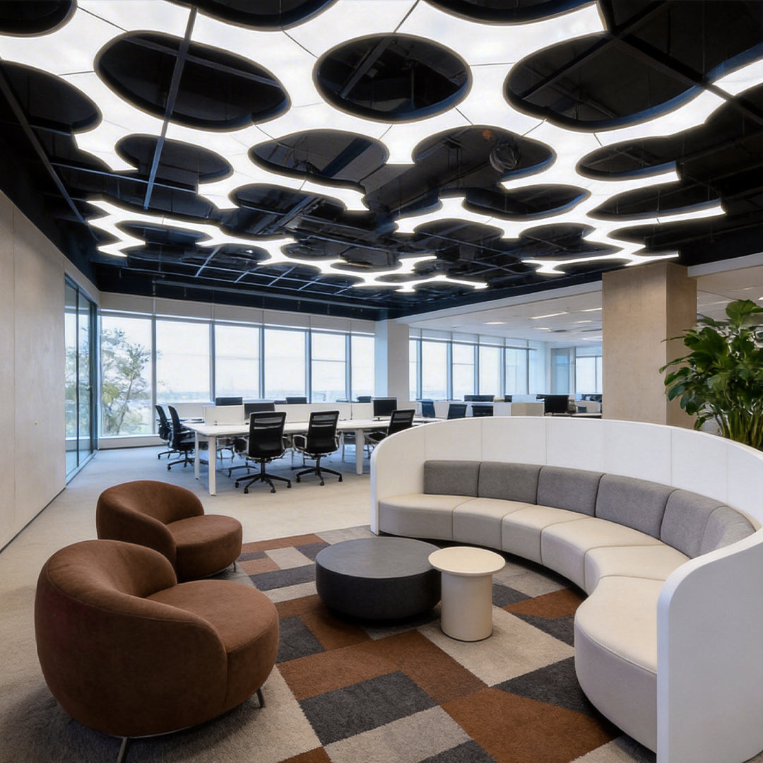 Modern office space featuring a sleek LED linear chandelier with minimalist design and ambient lighting.