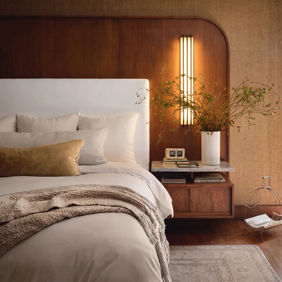 LED modern wall lights illuminating a bedside area with warm ambient lighting.