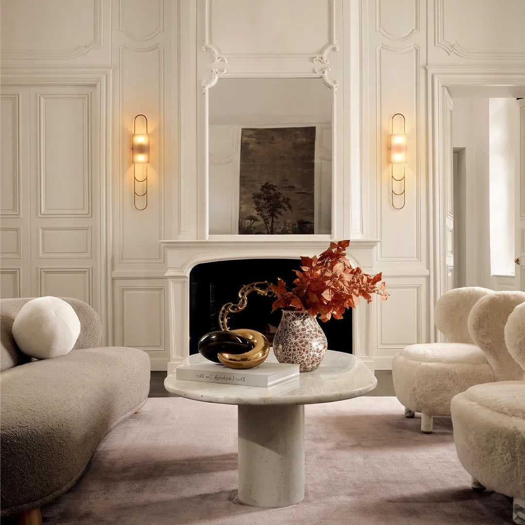 LED modern wall sconces flanking a fireplace in a contemporary living room with elegant warm illumination.