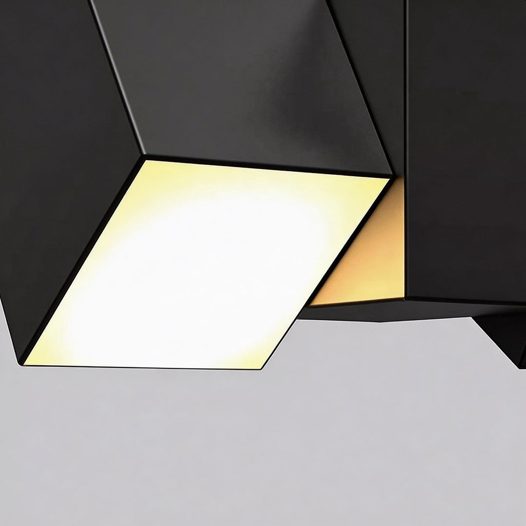 LED outdoor lighting wall mount with a sleek geometric design, providing ambient lighting.