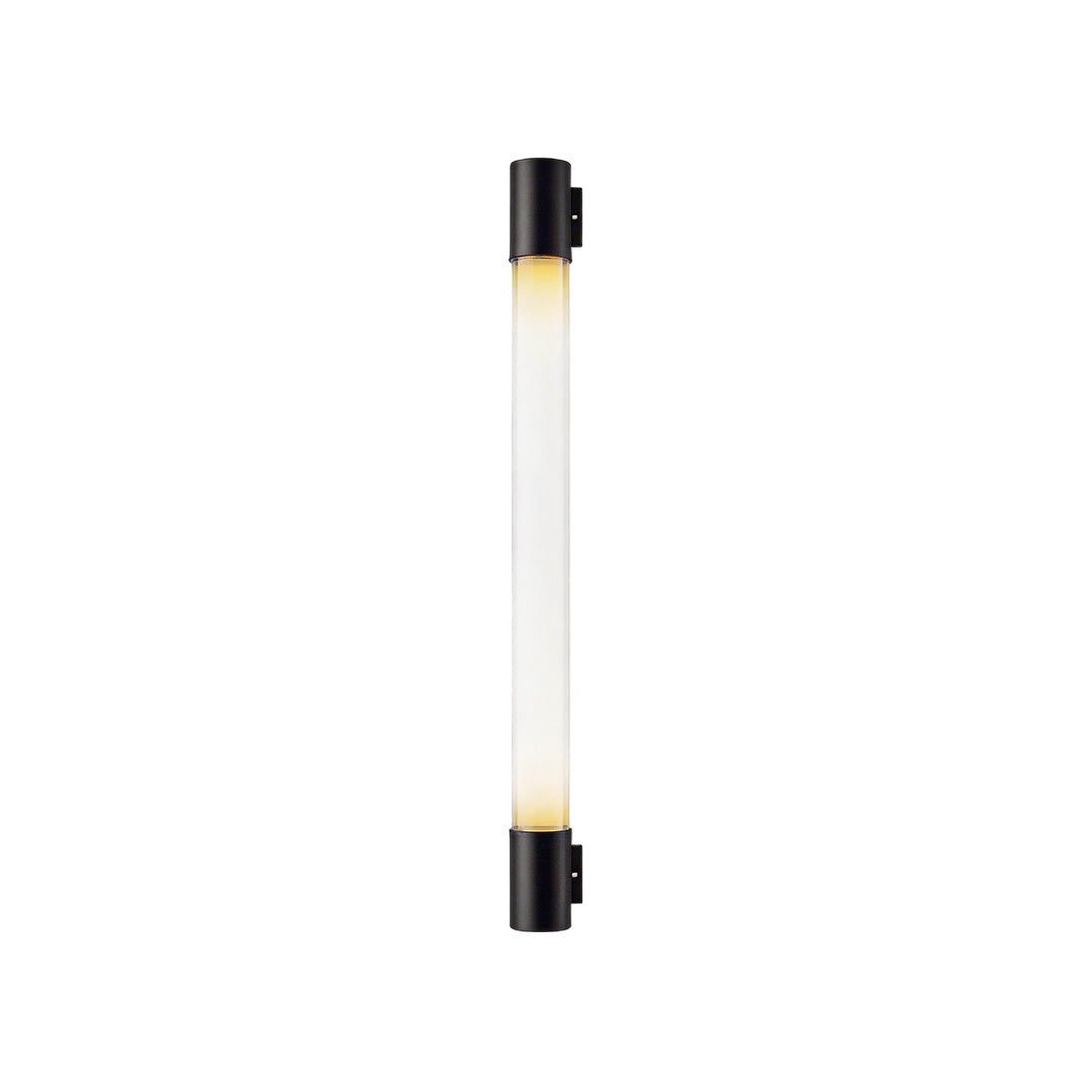LED outdoor sconce with a cylindrical design, enhancing a modern exterior.