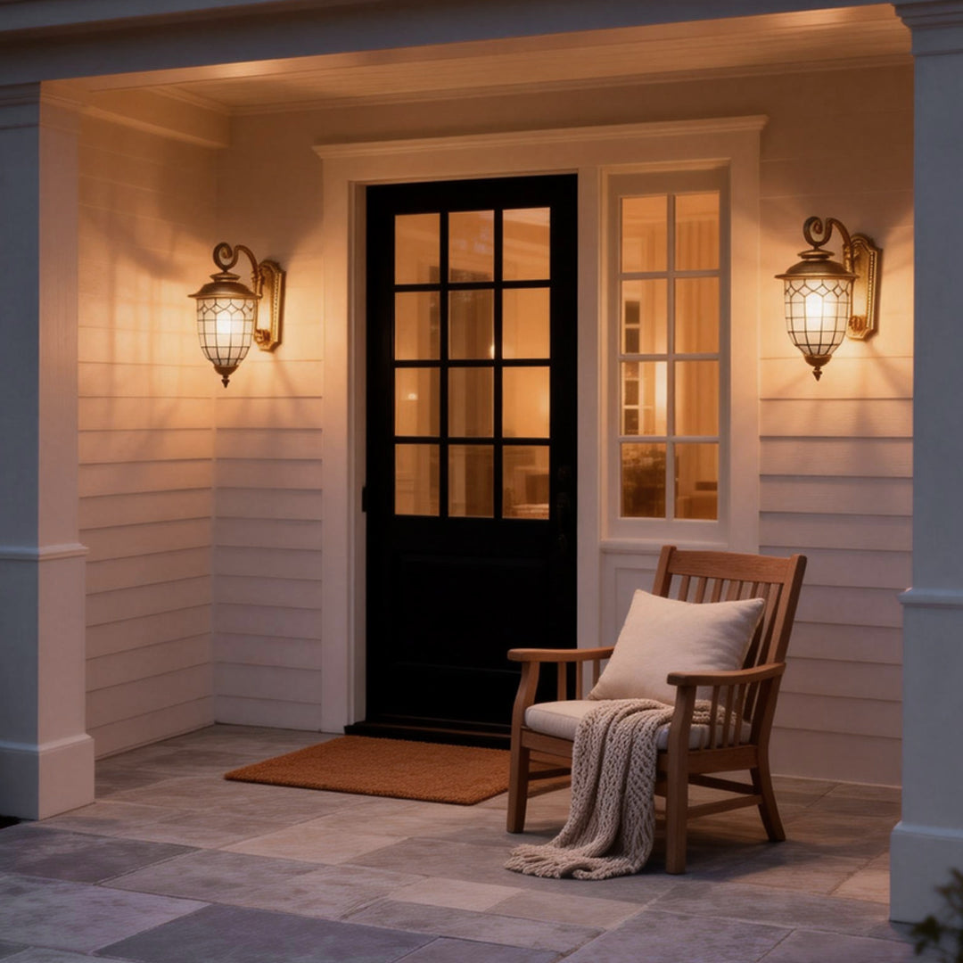 LED outdoor sconce mounted beside front door with classic lantern design.