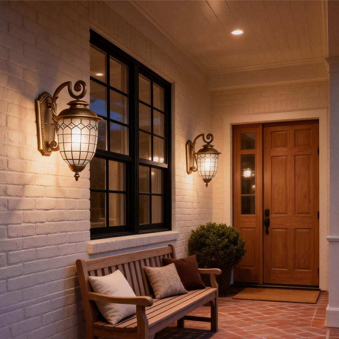 LED outdoor sconce installed on front porch creating warm and welcoming entry lighting.