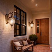 LED outdoor sconce installed on front porch creating warm and welcoming entry lighting.
