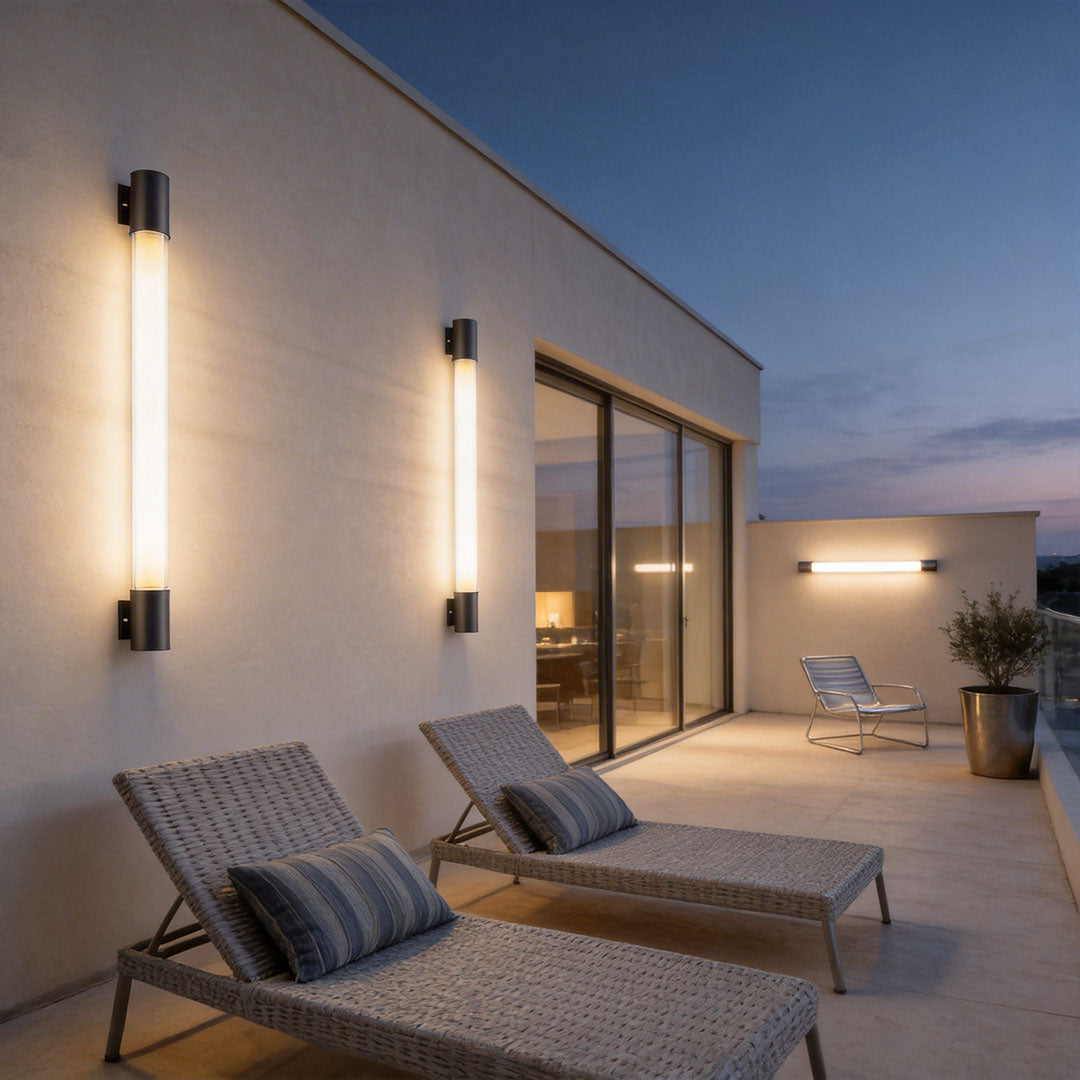 LED outdoor sconce with a modern design, providing ambient lighting near a patio.