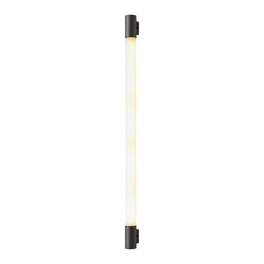 LED outdoor sconce with a modern design, placed on a concrete surface.