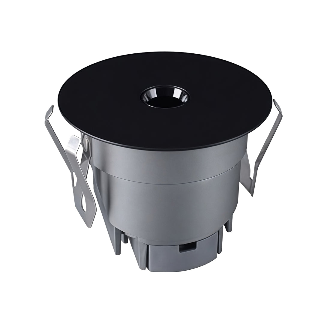 LED recessed spotlight with black trim and cylindrical housing for modern ceiling installations