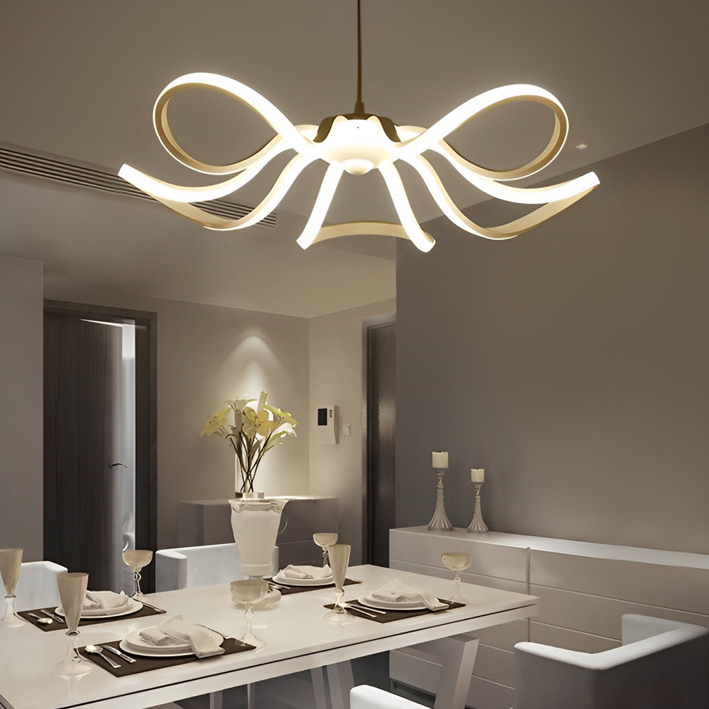 LED ribbon chandelier with a white finish, providing ambient light in a sophisticated dining area.