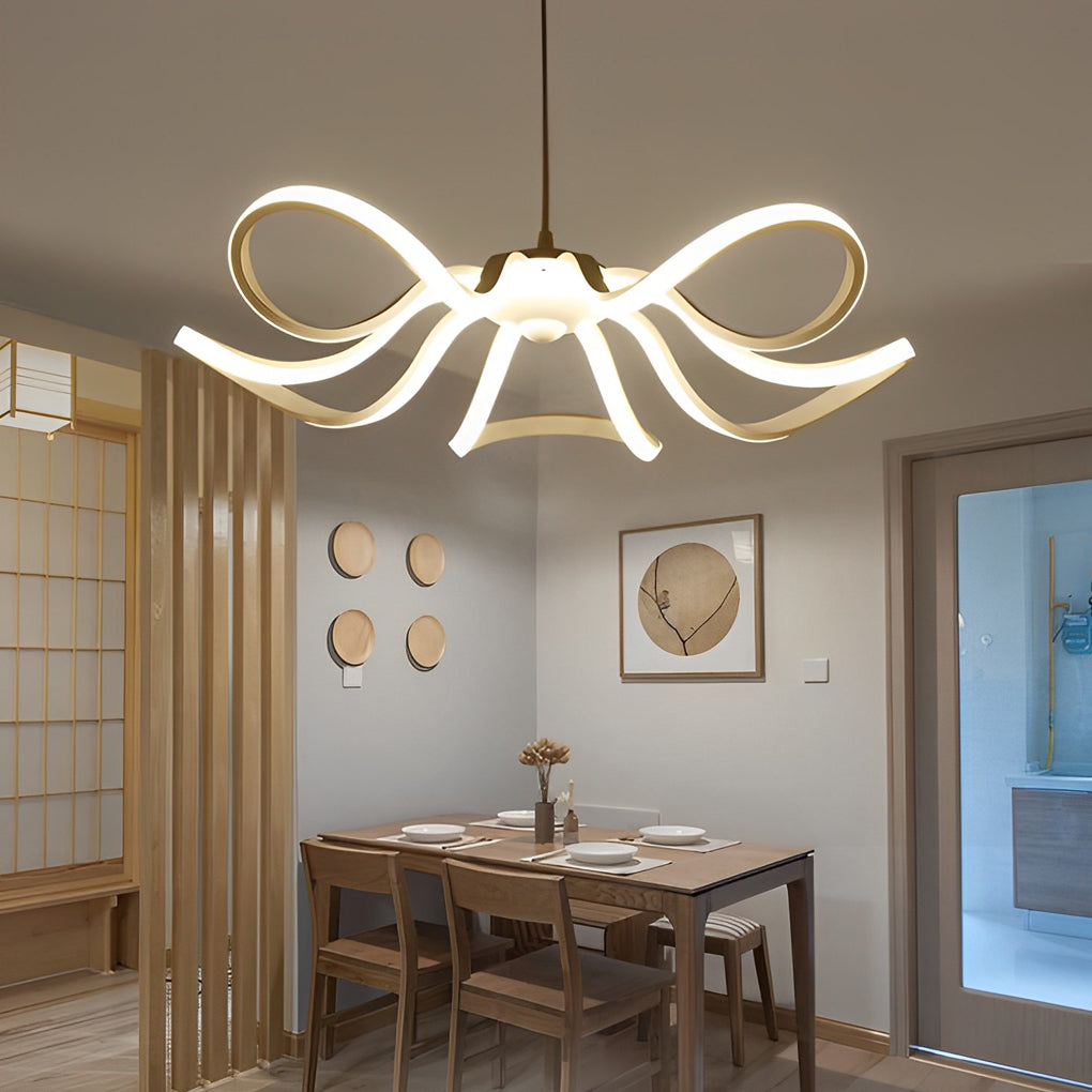 LED ribbon chandelier illuminating a wooden dining table, blending seamlessly with natural decor.