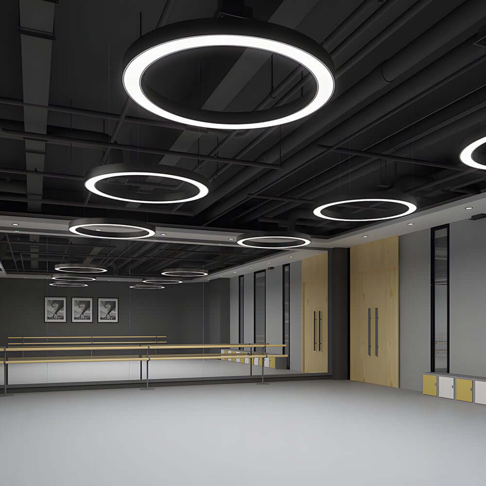 LED ring pendant lights used in a modern workspace