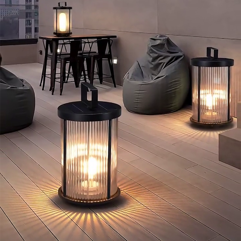 LED solar lantern for outdoor use, providing ambient light on a wooden deck with modern furniture.