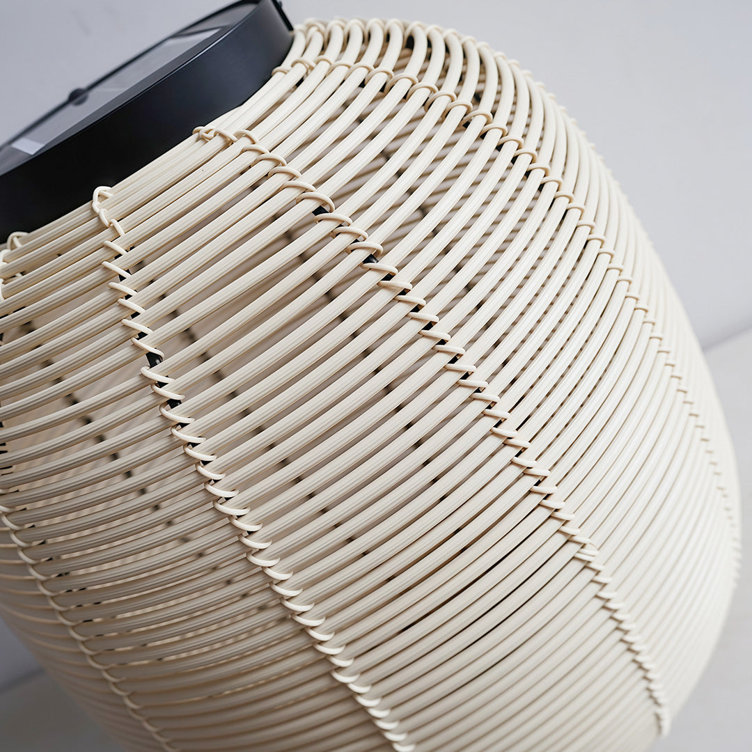 LED solar lantern casting a soft glow over a modern outdoor space, creating an inviting atmosphere.