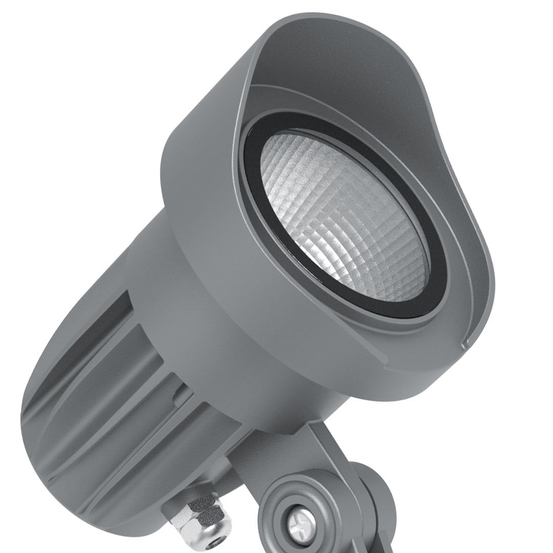 Close-up detail of LED spotlight head showing heat sink fins and precision optical design