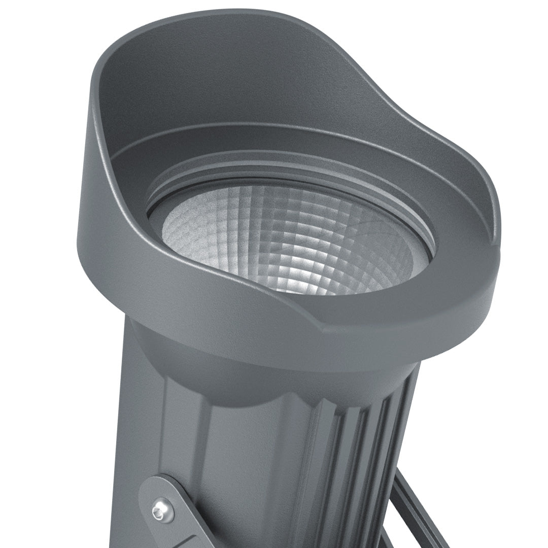 Close-up detail of LED spotlight head showing heat sink design and precision optical components