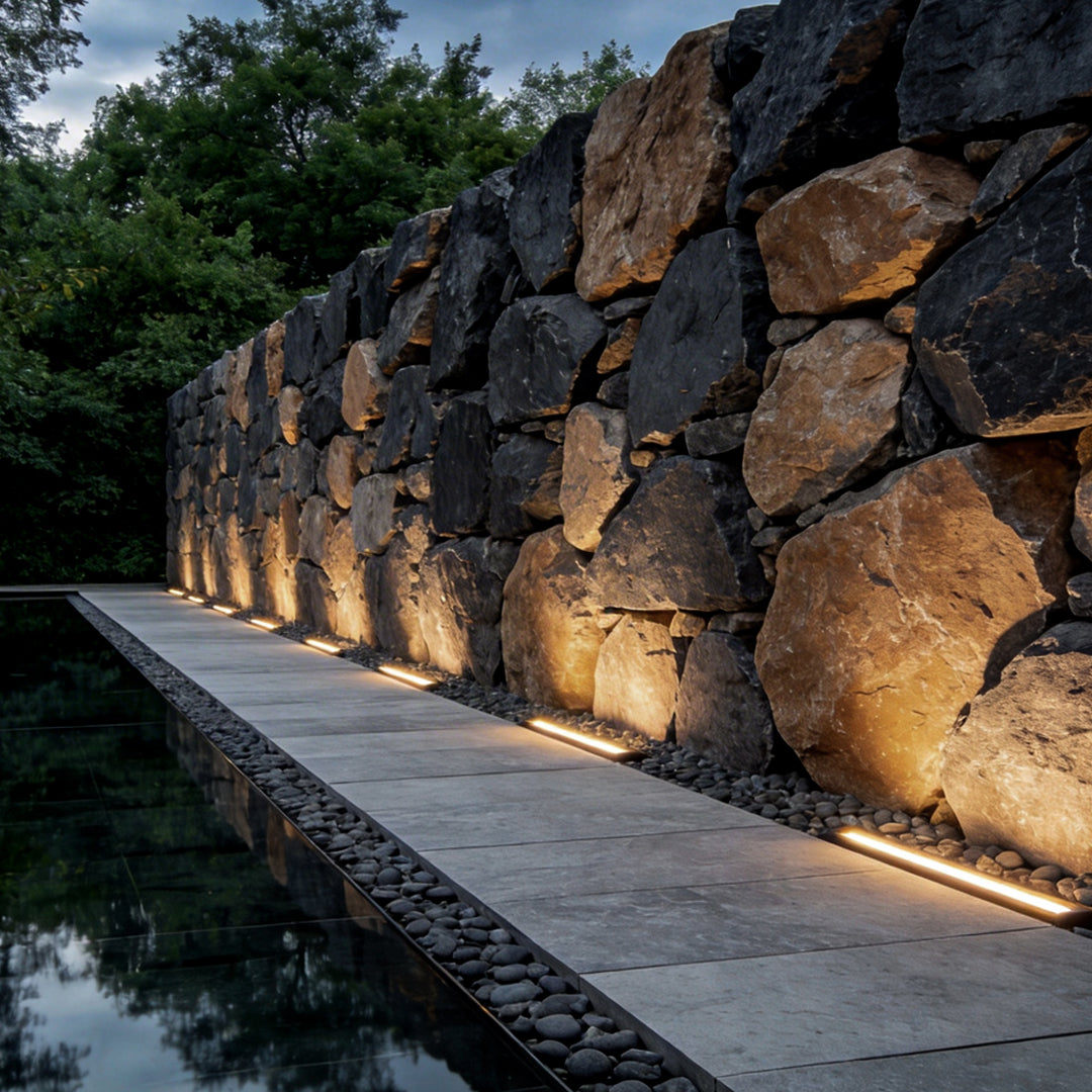LED strip lights on wall enhancing a modern garden walkway with soft glow.