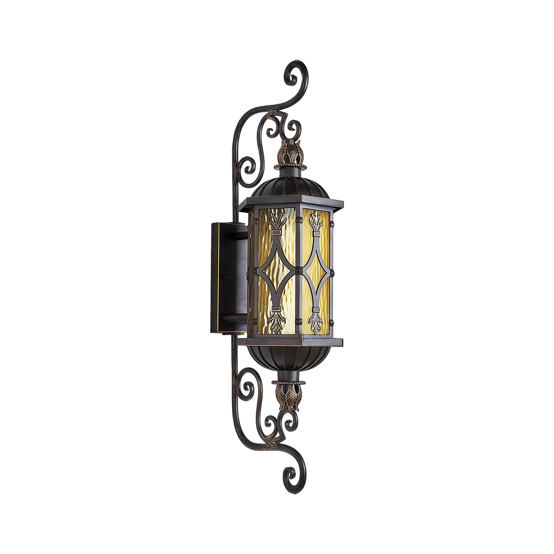 LED wall light in antique brass with elegant curves, placed beside a sophisticated entrance.