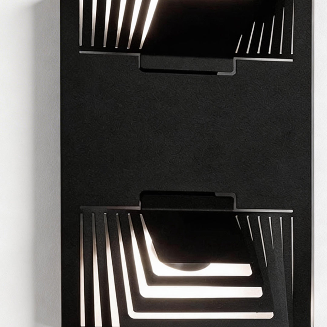 LED wall sconce outdoor detail of wall mount outdoor light with geometric lines and modern black finish.