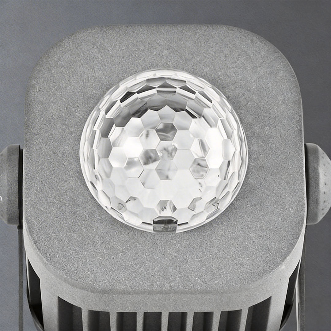 LED wall sconce outdoor exterior spotlights front lens close-up with textured glass diffuser.