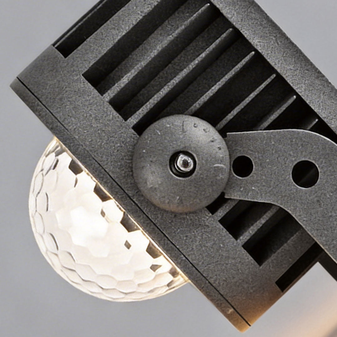 LED wall sconce outdoor exterior spotlights close-up showing lens and heat sink design detail.