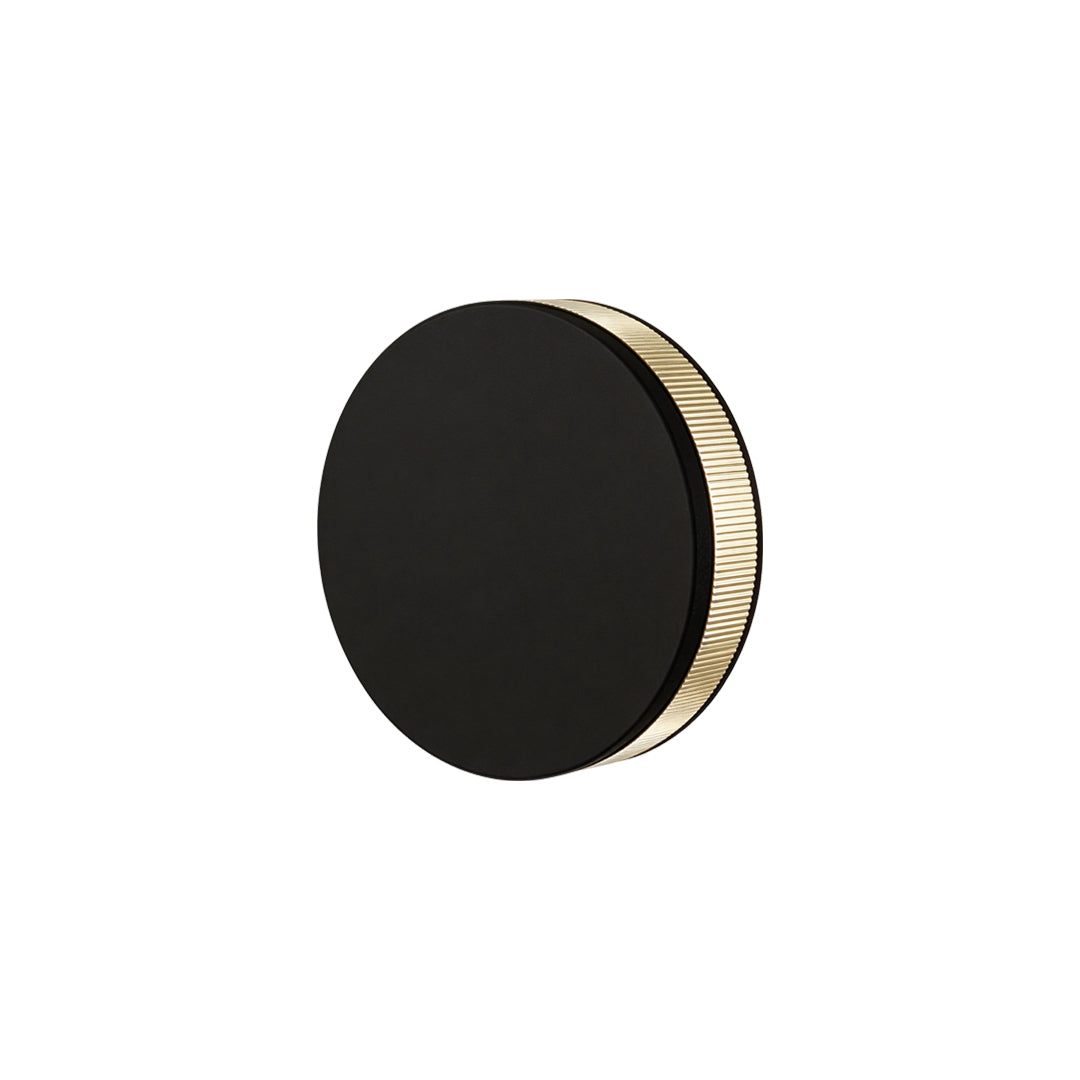LED wall sconce outdoor front view isolated on white background, minimalist round black wall light.