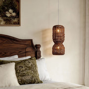 LED wall sconce outdoor large modern pendant light fixtures with woven shade beside bed in cozy bedroom.