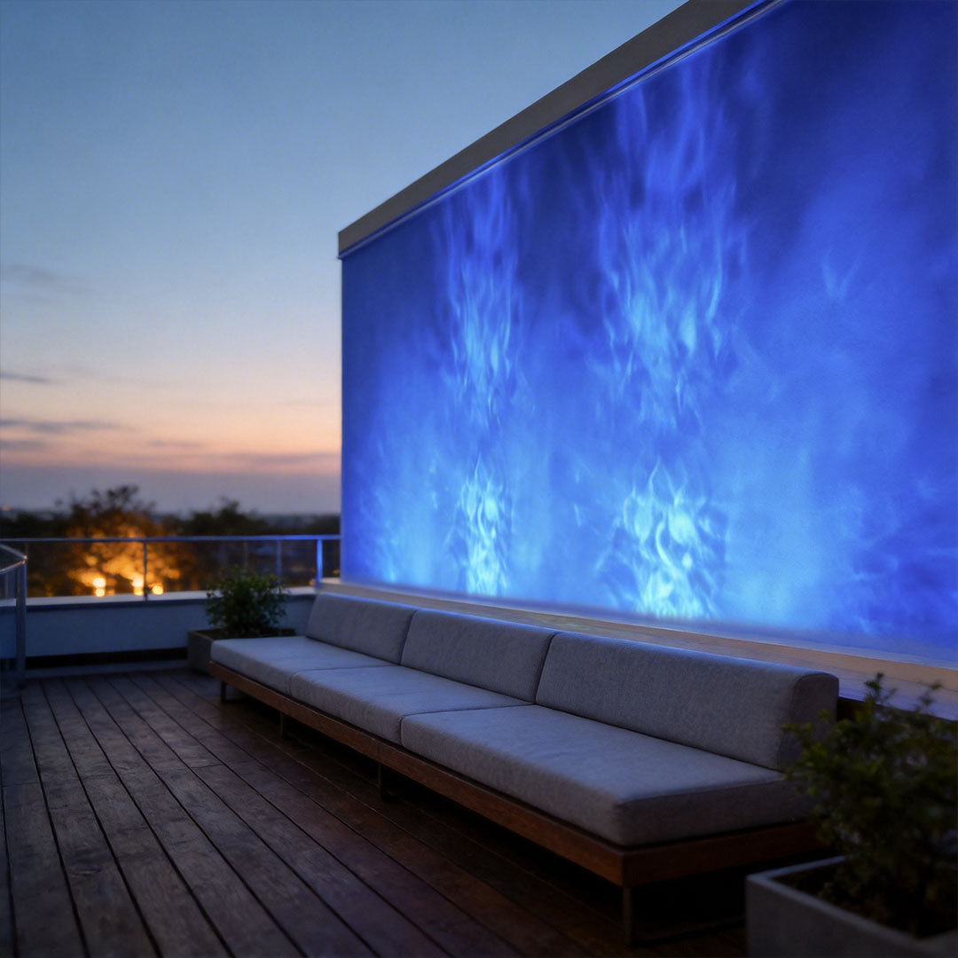 LED wall sconce outdoor outdoor spotlight LED creating blue wave lighting effect on large outdoor wall.