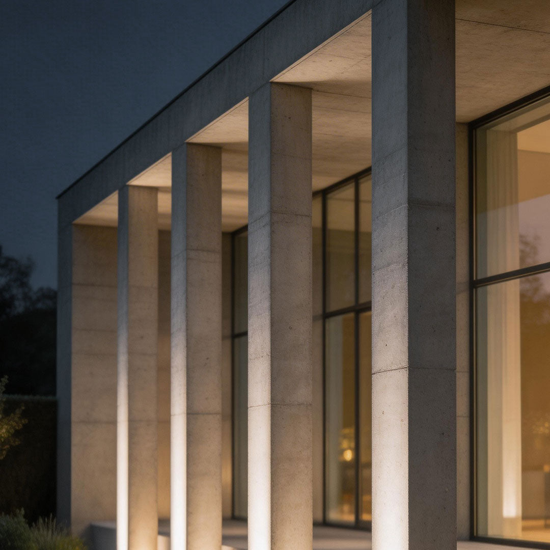 LED wall sconce outdoor outdoor spotlights LED enhancing concrete facade with soft upward illumination.