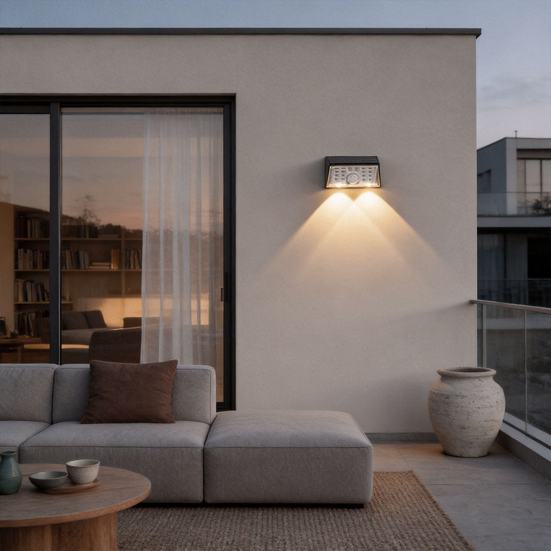 LED wall sconce outdoor sensor wall lights outdoor along house exterior, multiple fixtures providing smart lighting.