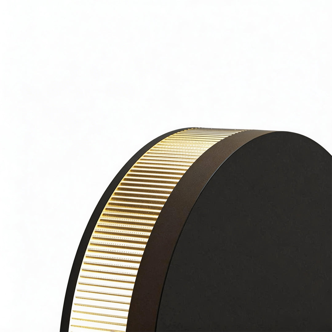 LED wall sconce outdoor angled side view, modern circular fixture with layered design and warm glow.