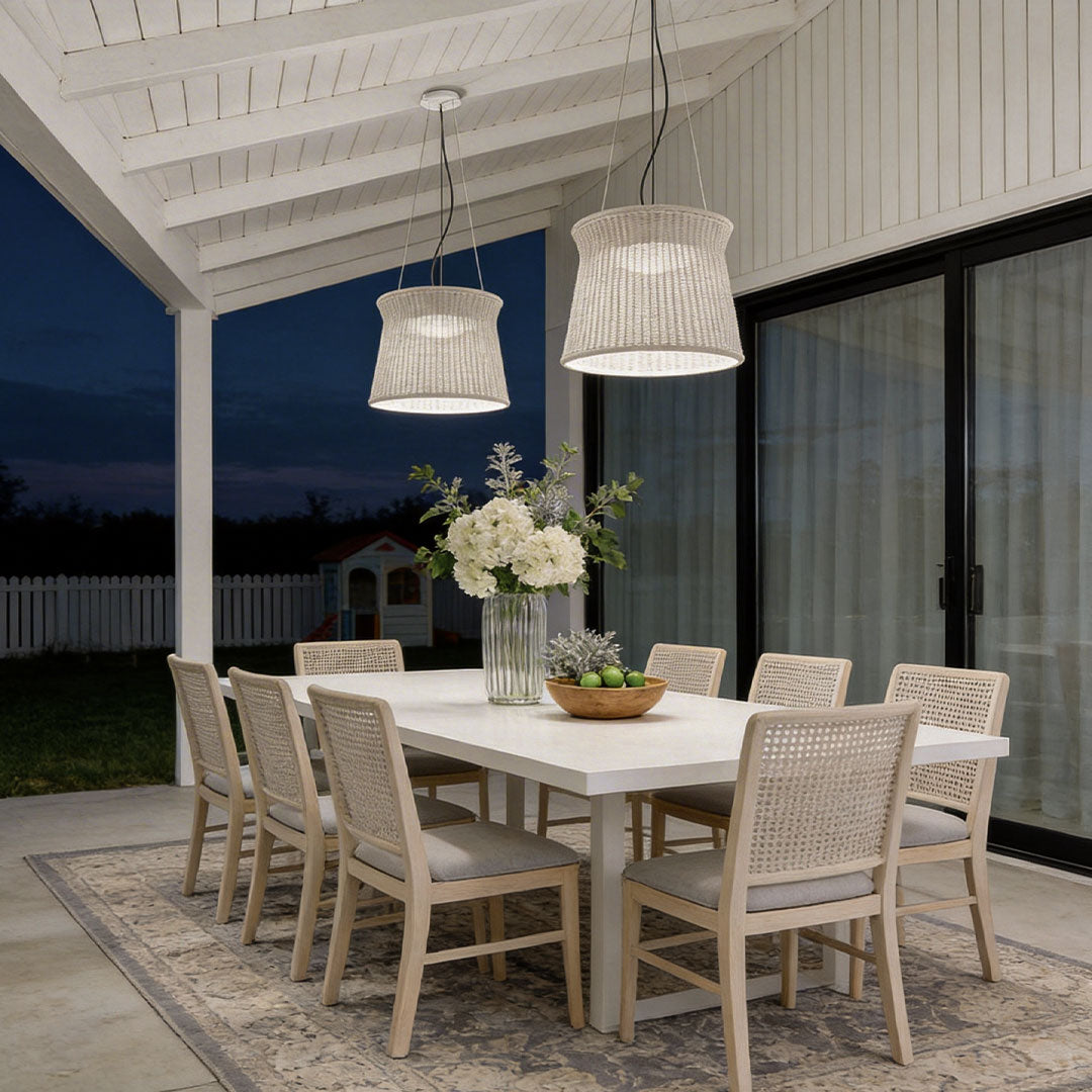 LED wall sconce outdoor woven light pendant on patio ceiling, soft warm lighting for outdoor dinner setting.